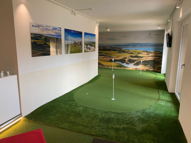 Naperville indoor putting green in an office with scenic wall art